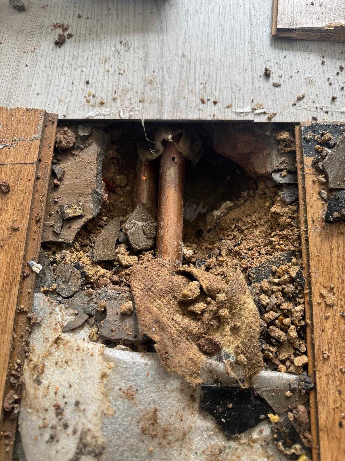 Before: Pinhole in the central heating flow pipe