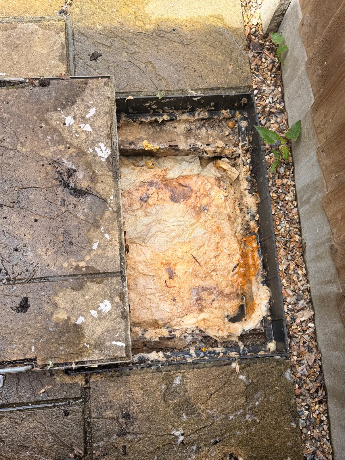 Before: Blockage on Manhole been cleared
