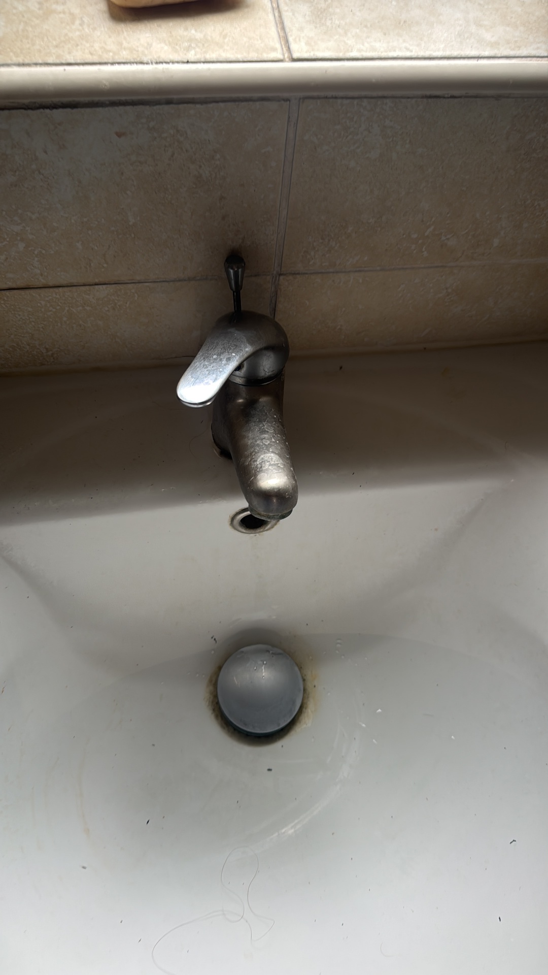 Before: Wash basin mixer tap replaced